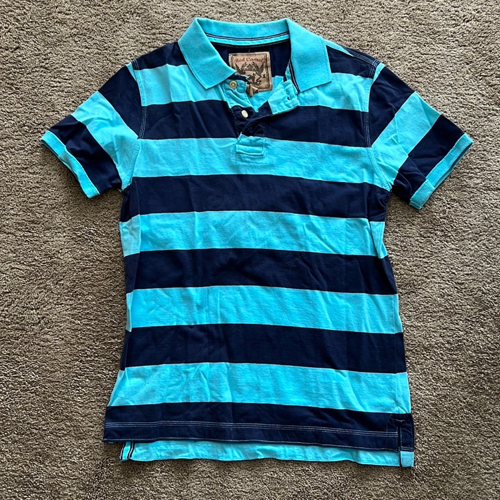 Medium navy and light blue striped polo shirt